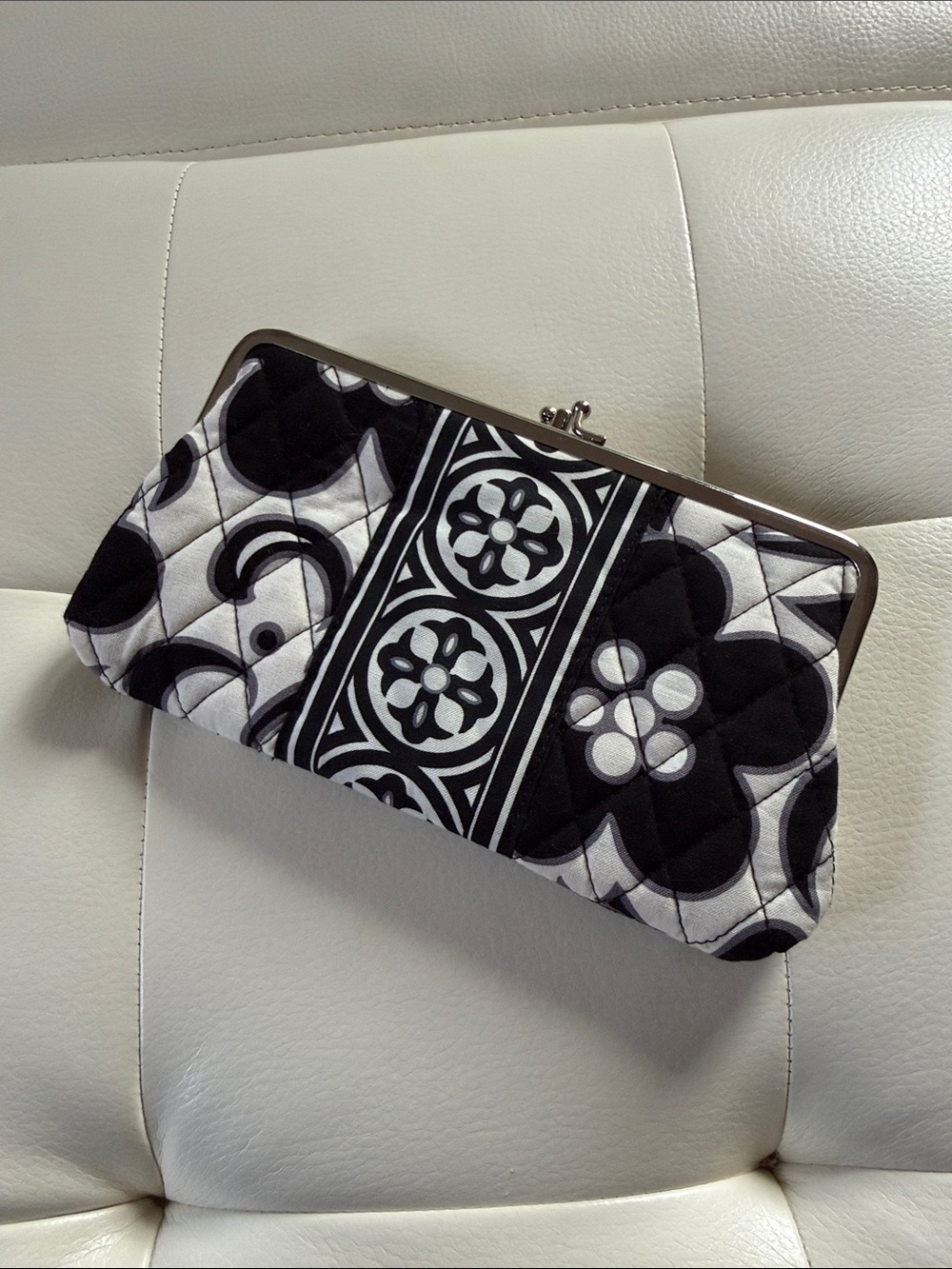 Never used Vera Bradley Quilted Black & White Floral Frame Clutch